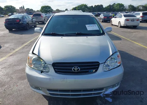 2004 Toyota Corolla Le z USA, uszkodzony, nr VIN JTDBR32EX42024809